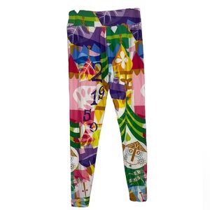 Disney ride themed It’s a small world abstract geometric brightly colored pant